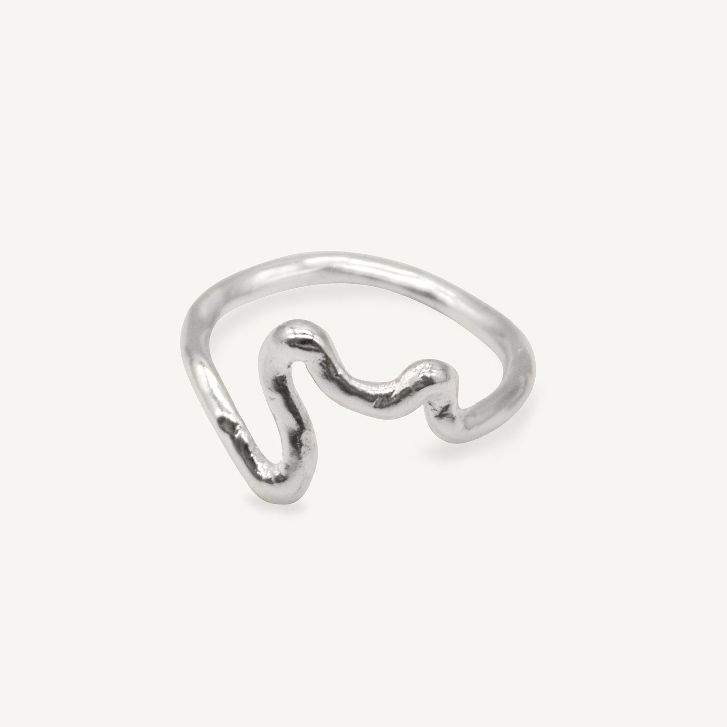 Emory 02 - a playful silver line drawing stacking ring with organic textured silver finish ethically handmade in London from recycled silver by Folde Jewellery