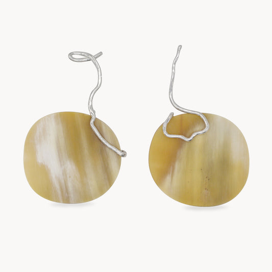 Sculptural statement silver earrings handcrafted by Folde Jewellery in London ethically handmade using recycled silver and highland horn.