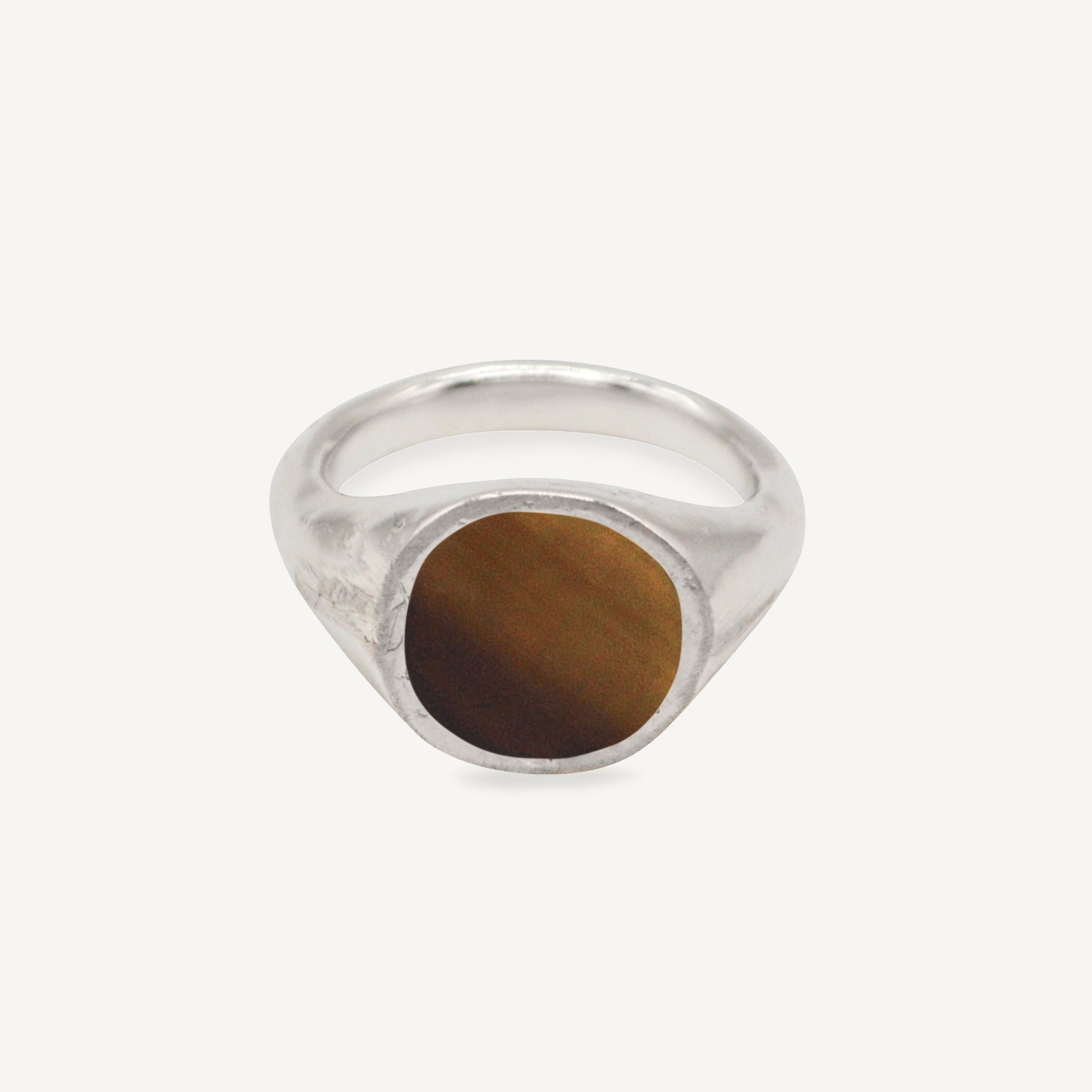 The RAY ring is a chunky silver and horn signet ring with organic textured silver finish ethically handmade in London from recycled silver by Folde Jewellery