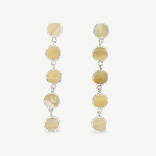 Sculptural statement silver drop earrings handcrafted by Folde Jewellery in London ethically handmade using recycled silver and highland horn.