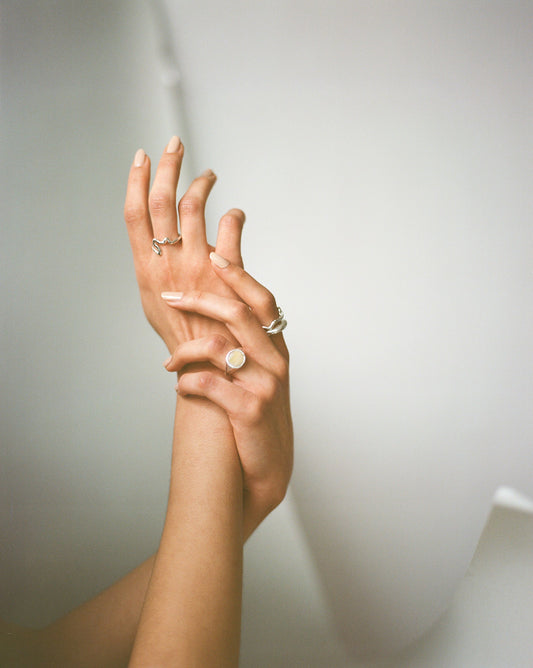 Emory 02 - a  playful silver line drawing stacking ring with organic textured silver finish ethically handmade in London from recycled silver by Folde Jewellery