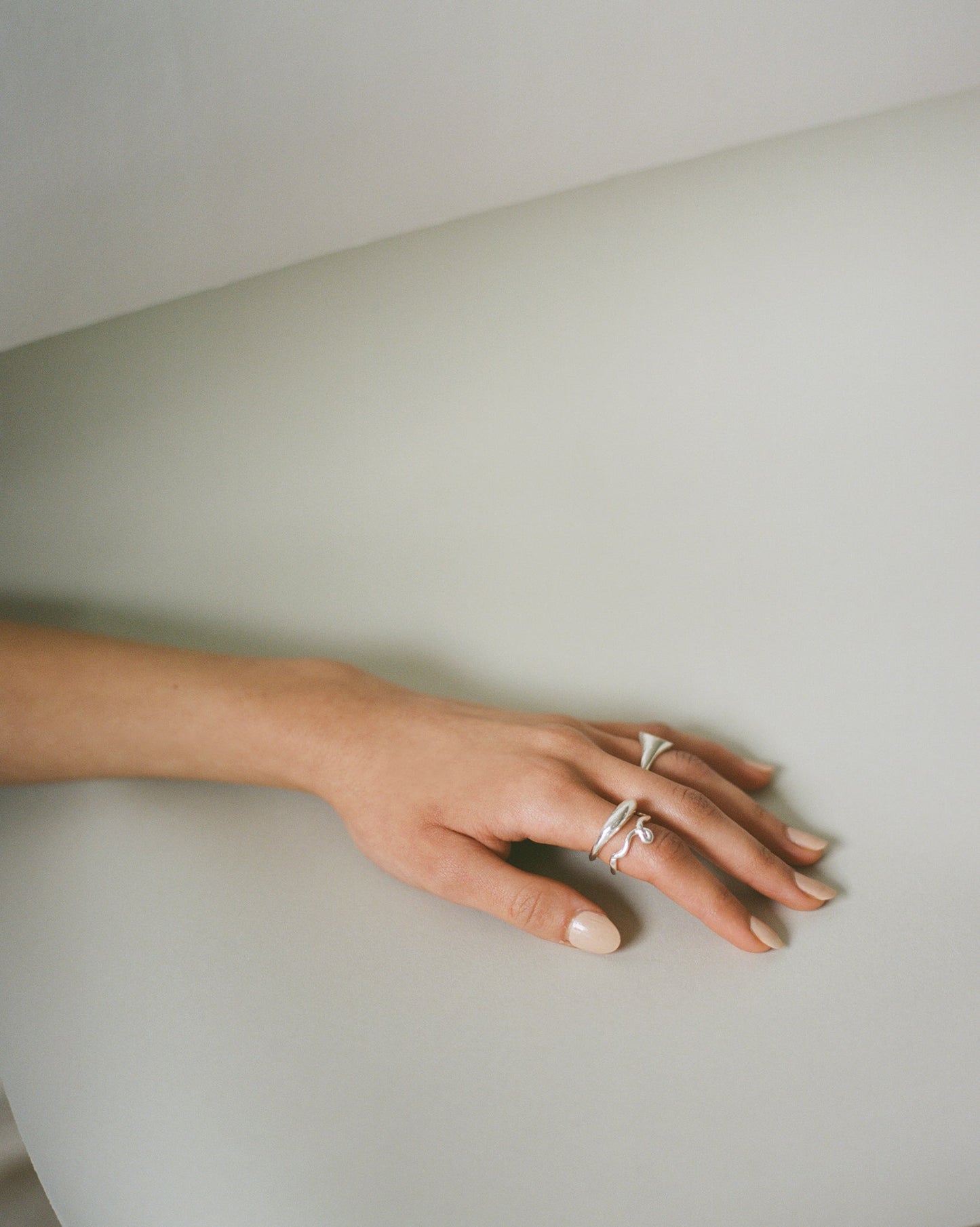 Emory 03 - a  playful silver line drawing stacking ring with organic textured silver finish ethically handmade in London from recycled silver by Folde Jewellery